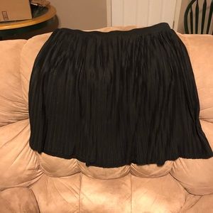 Black mini pleated skirt